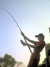 Young angler in action in Bangkok.