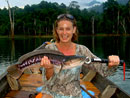 Lady with Giant Snakehead.
