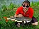 Lady with Redtail Catfish.
